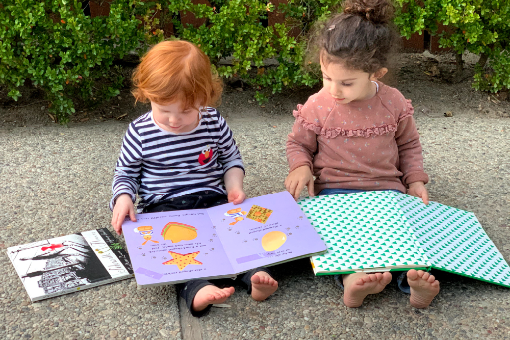 Children reading together at the Children's School
